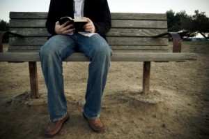 man-reading-bible-300x199